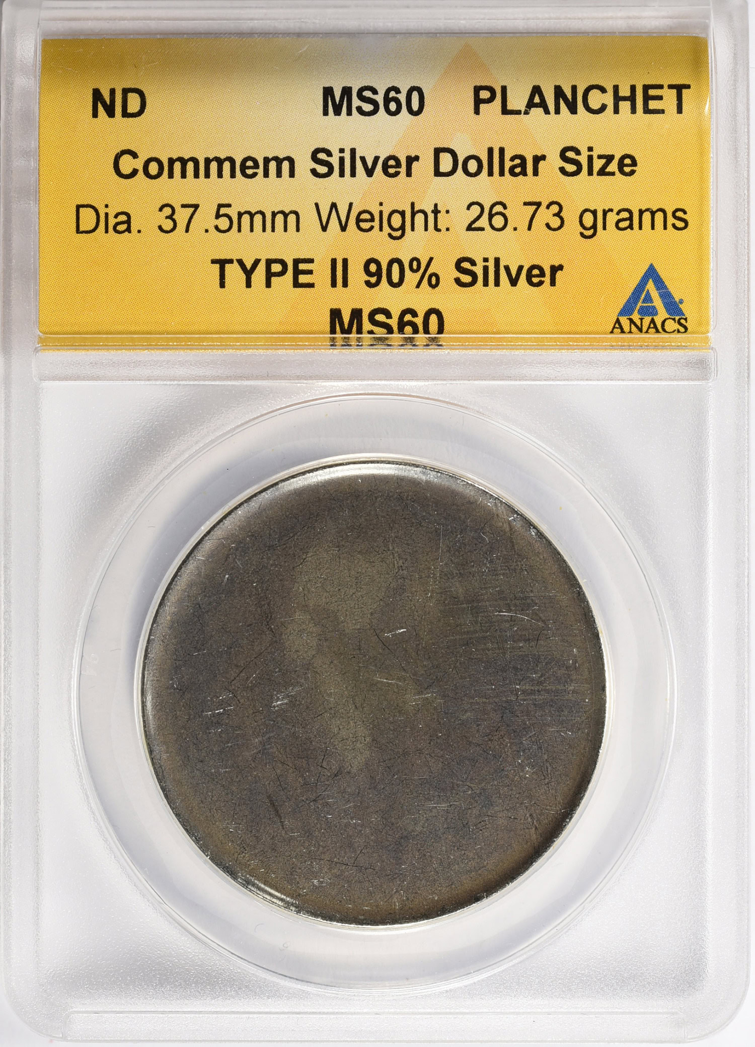 Mint Error ND Commem Silver Dollar Size Dia. 37.5mm Weight: 26.73 grams  Type II 90% Silver Planchet ANACS MS-60 | ANACS Cert #3220002426 |  GreatCollections Coin Auctions Item #1430850