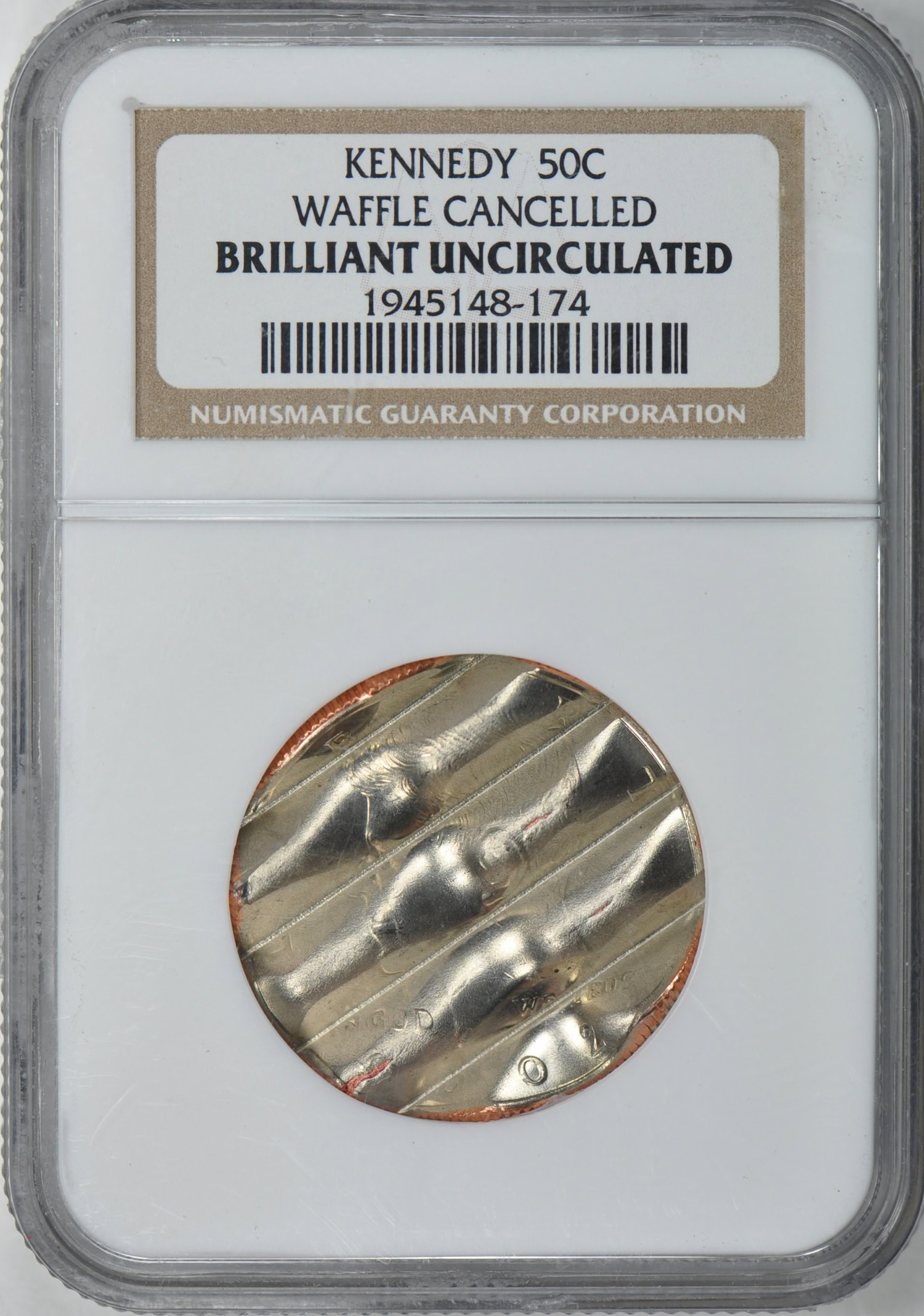 Mint Error Kennedy Half Dollar Waffle Cancelled NGC Brilliant