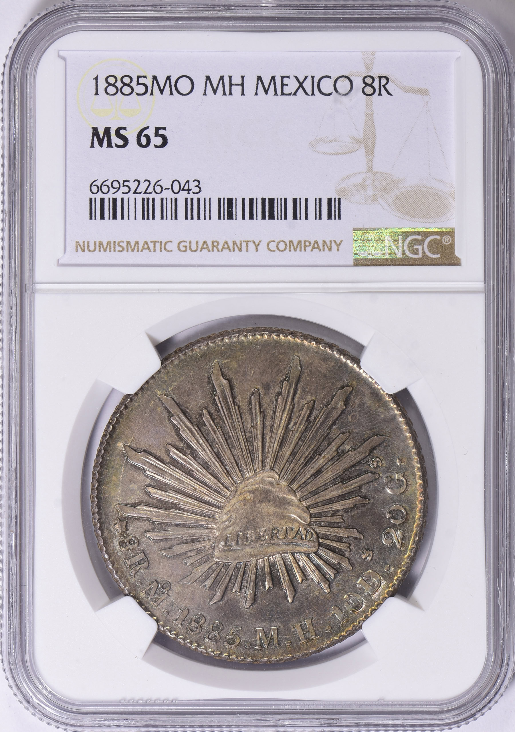 Mexico 1885-Mo MH Silver 8 Reales KM-377.10 NGC MS-65 (Toned