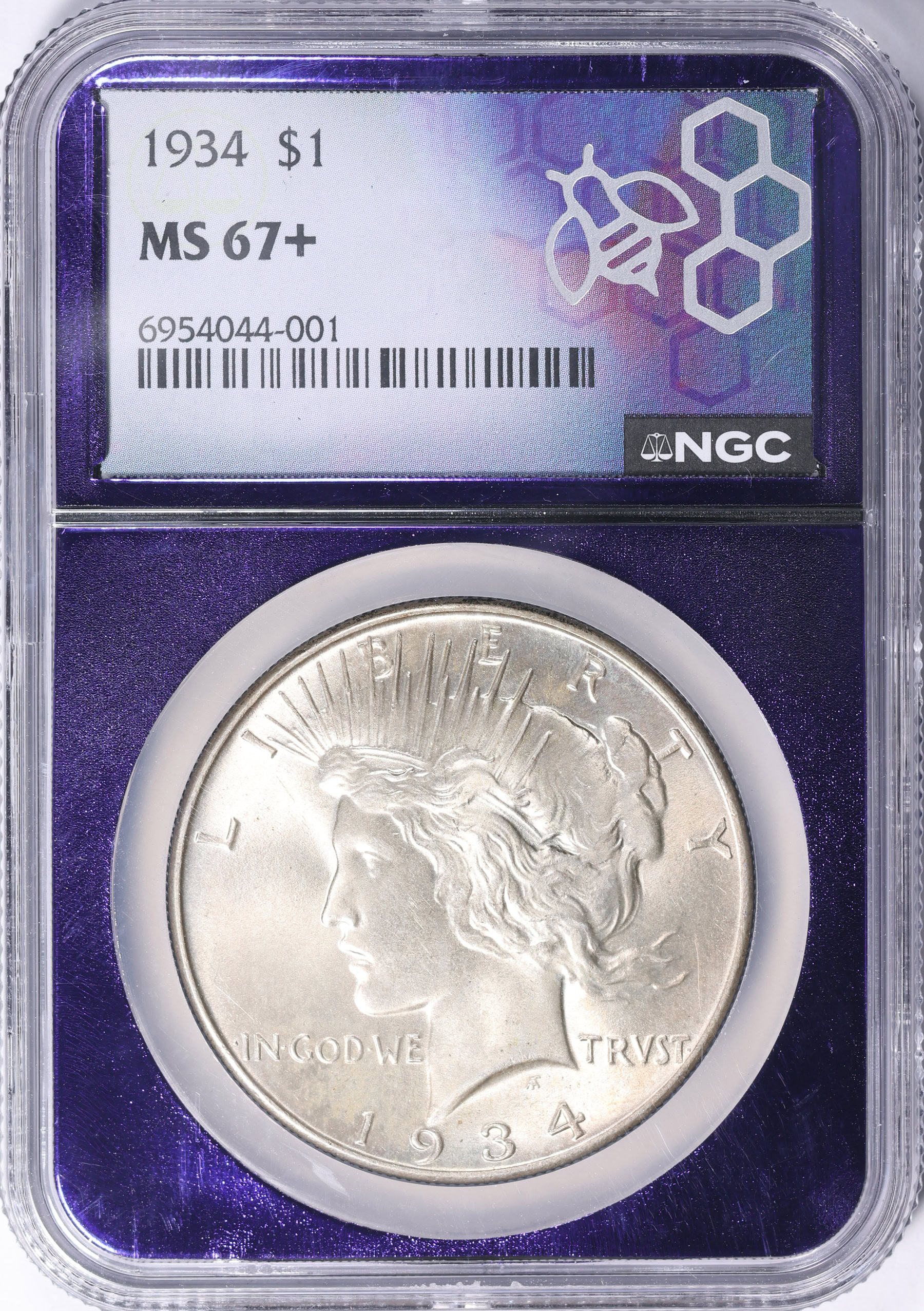 1934 Peace Silver Dollar NGC MS-67+ (Purple Bee Frame Holder