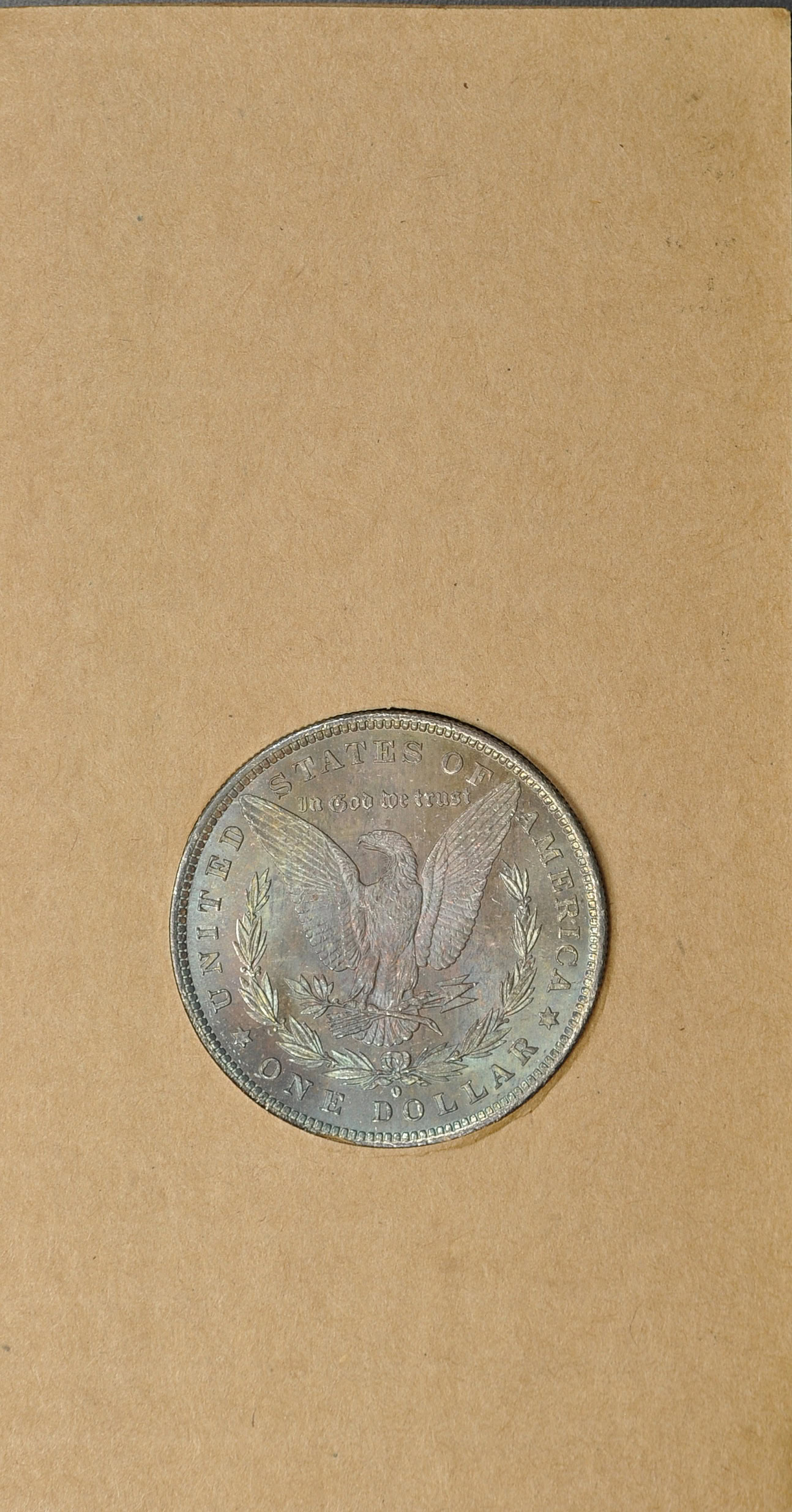 1884-O Morgan Silver Dollar Uncertified in Tidy House Products Co